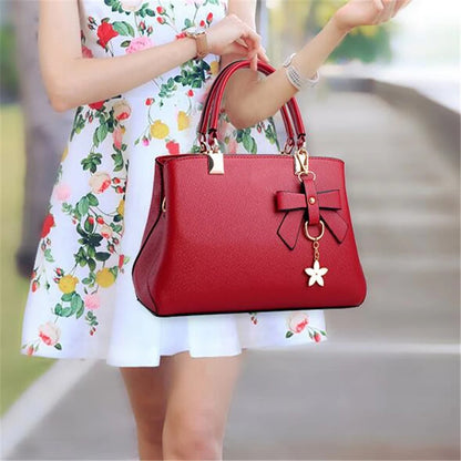 Elegant Women Hand Bags with flower pendant